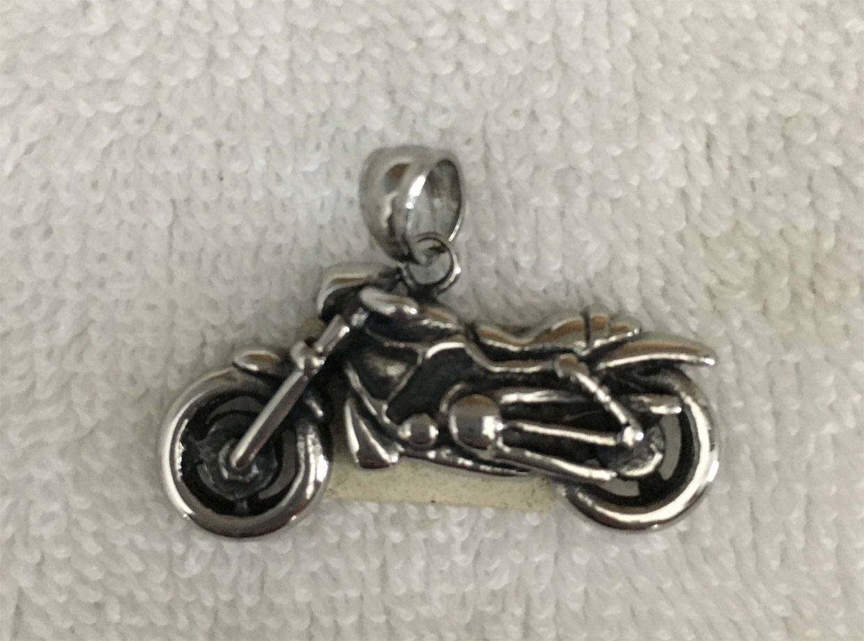 Silver motor cycle